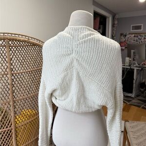 a white shawl/cardigan, kids,